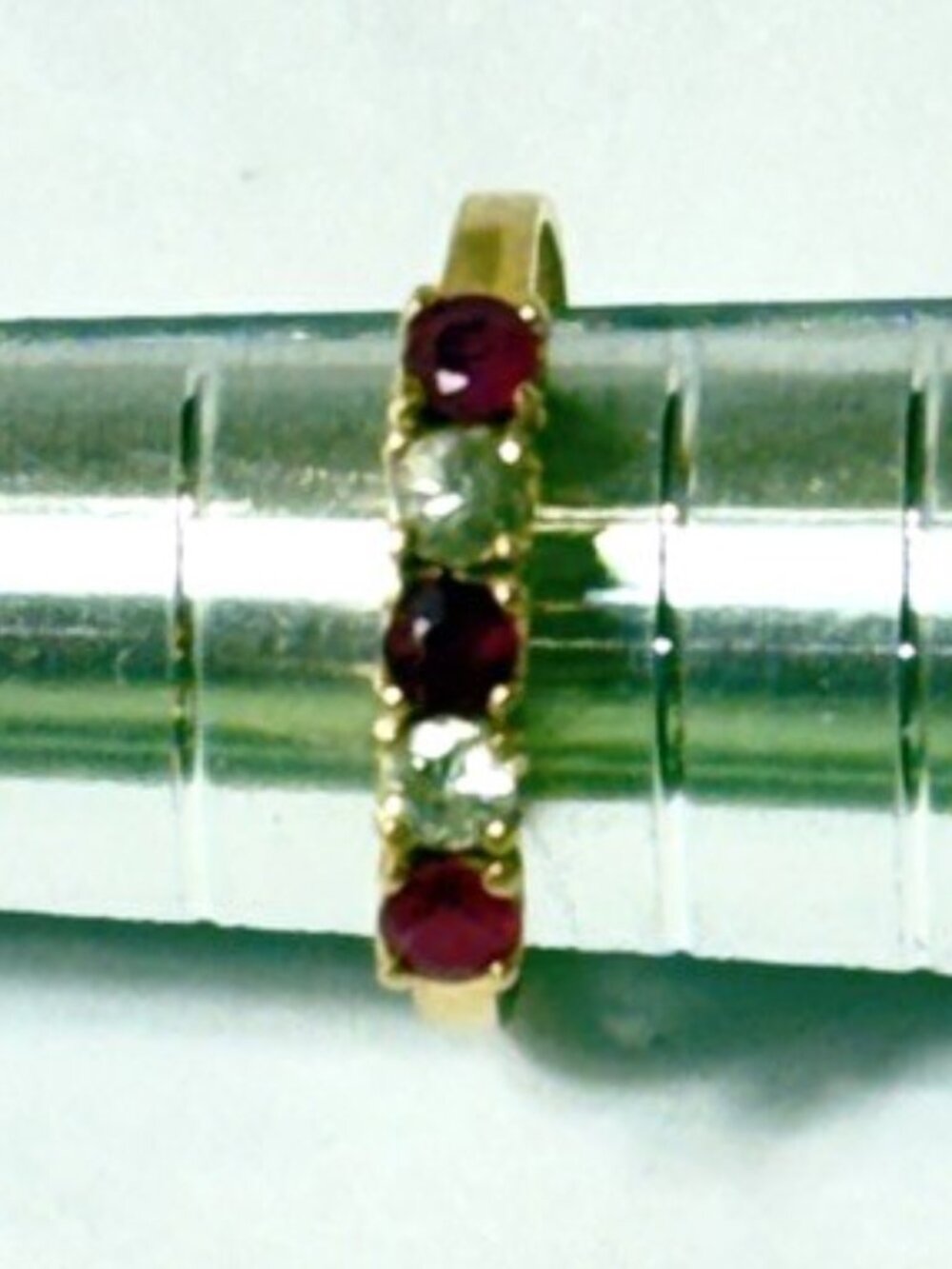 Tiny ruby and diamond 14K ring.